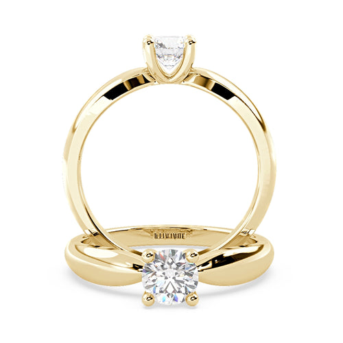 Anillo de Compromiso Solitario &quot;Tapered&quot; con Diamante de Laboratorio Corte Redondo de 0.50qt (D/E-VVS2/VVS1) en Oro de 14K