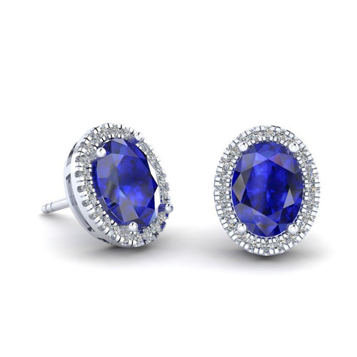 Aretes ovalados de Zafiro Natural de 8mm x 6mm y Halo de Diamantes en Oro Blanco de 14K