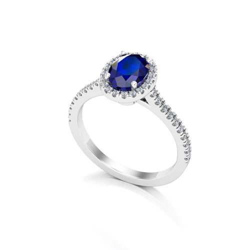 Anillo de Compromiso Halo y Pavé &quot;Lady Diana&quot; con Zafiro Natural de 7x5mm en Oro de 14K