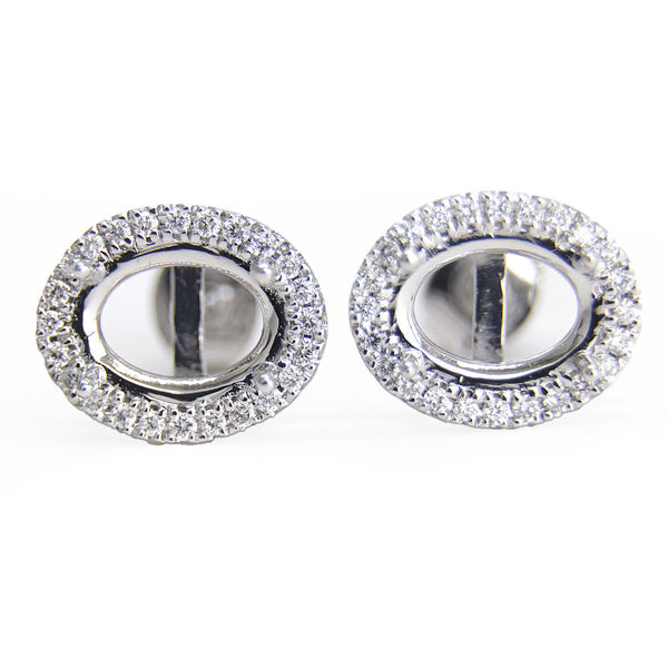 Aretes ovalados de 8mm x 6mm y Halo de Diamantes en Oro Blanco de 14K